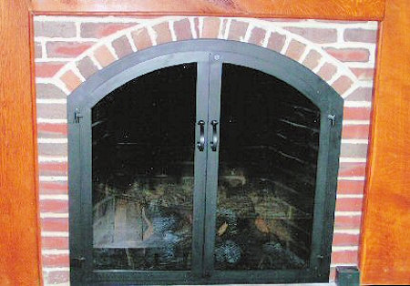 Osterville Arch       All flat black finish, twin door with standard forged handles smoke glass, no mesh, no draft panel.  Standard brick installation.
